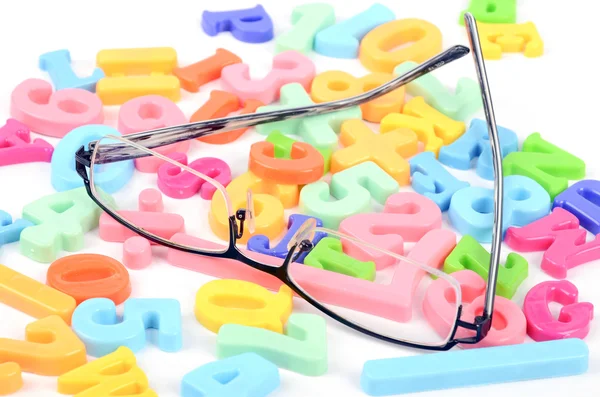 Eye glasses and letters — Stock Photo, Image