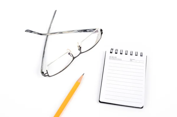 Óculos e lápis com bloco de notas — Fotografia de Stock