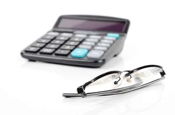 Calculator and glasses — Stock Photo, Image