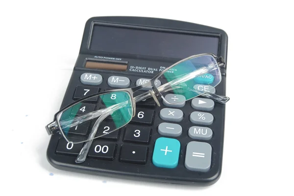 Calculadora e óculos — Fotografia de Stock