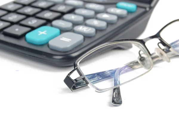 Калькулятор и очки — стоковое фото