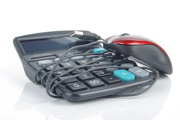 Calculator and computer mouse — Stock Photo, Image