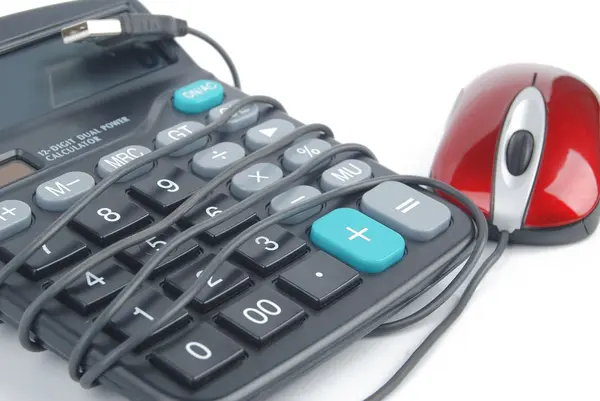 Calculadora e mouse de computador — Fotografia de Stock