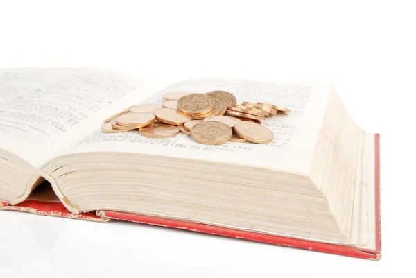 Dictionary and coin — Stock Photo, Image
