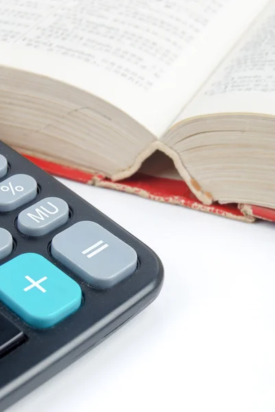 Dictionary and calculator — Stock Photo, Image