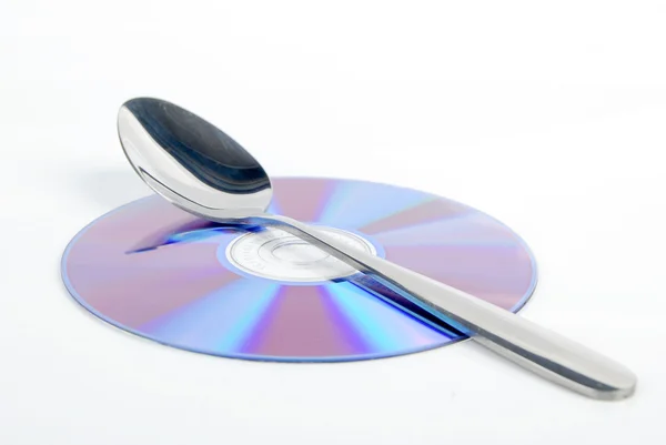 DVD e utensílios de mesa — Fotografia de Stock