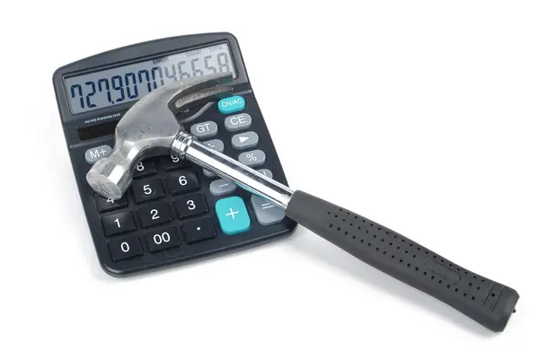 Hamer en rekenmachine — Stockfoto