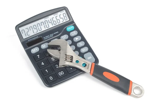 Skiftnyckel och miniräknare — Stockfoto