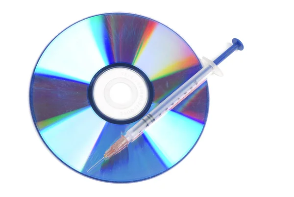 DVD and syringe — Stock Photo, Image