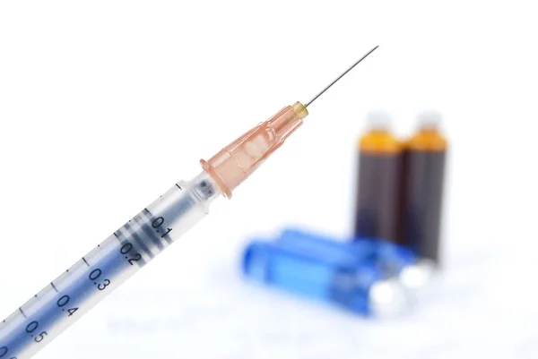 Medicine vials and syringe — Stock Photo, Image