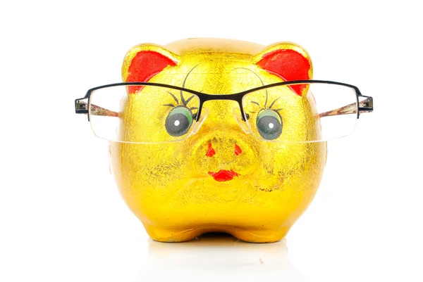 Piggy bank and glasses — Stock Photo, Image