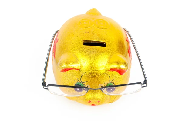 Piggy bank and glasses — Stock Photo, Image