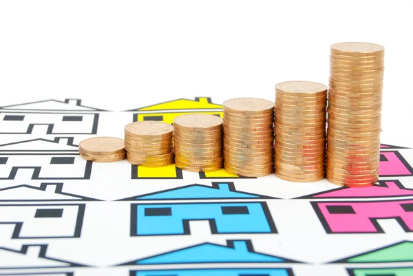 Coins and house — Stock Photo, Image