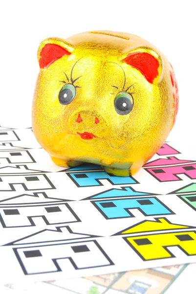 Piggy bank and house — Stock Photo, Image