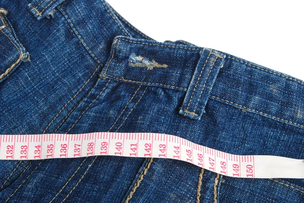 Maatregel tape en jeans — Stockfoto