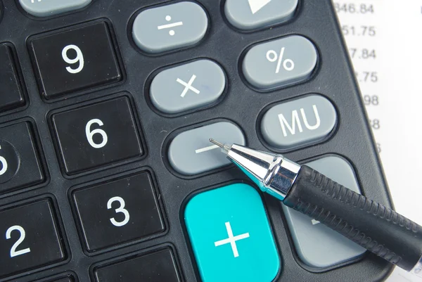 Calculator and pen — Stock Photo, Image