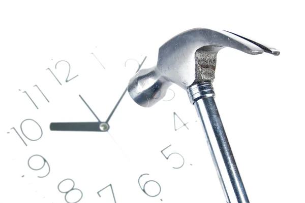 Hammer and clock on white background — Stock Photo, Image