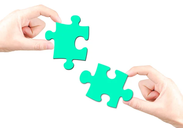 Hand and puzzle — Stock Photo, Image