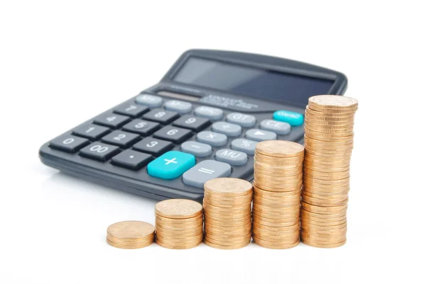 Calculator and coins — Stock Photo, Image