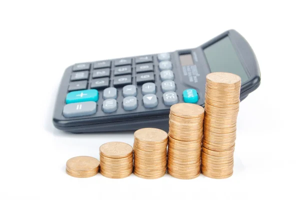 Calculator and coins — Stock Photo, Image