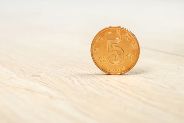 Münze auf dem Boden — Stockfoto