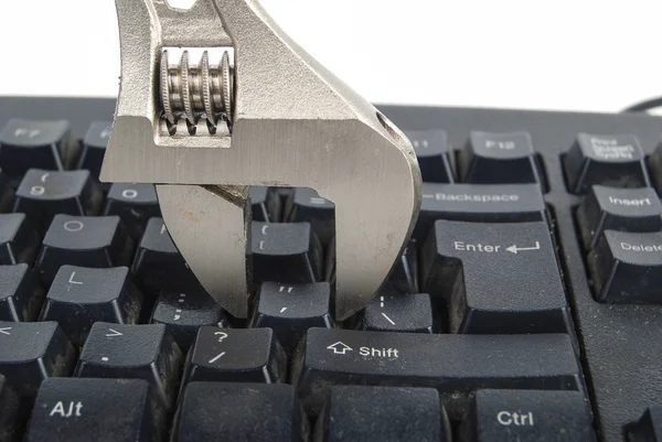 Klíč a klávesnice — Stock fotografie