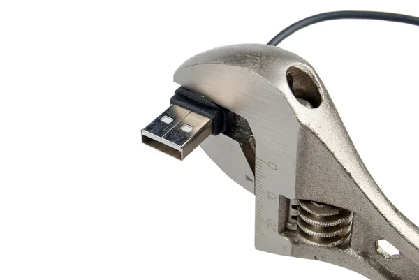 Schraubenschlüssel und USB — Stockfoto