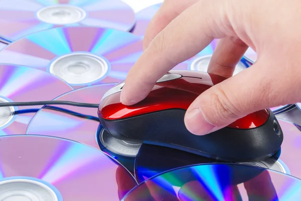 Computer mouse and DVD — Stock Photo, Image