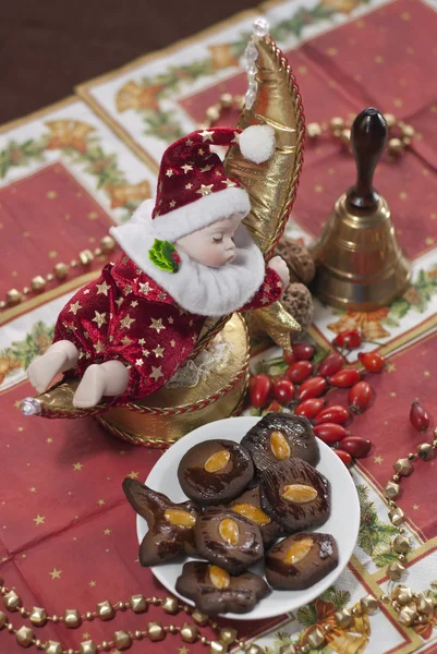 Christmas Doll with gingerbread brownies — Stock Photo, Image