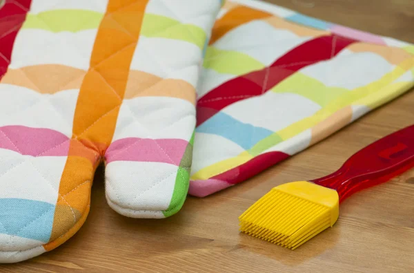 Silicone pastry brush and potholder — Stock Photo, Image