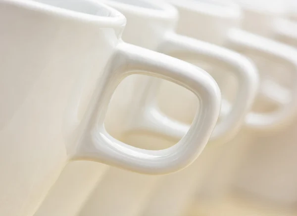 Witte cups met grepen — Stockfoto