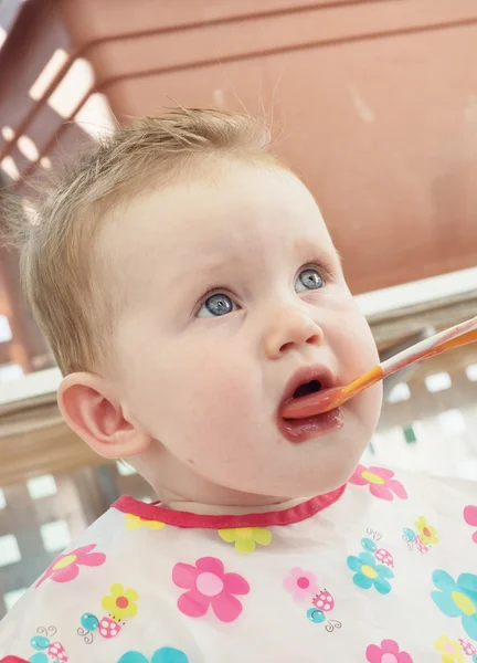 Little baby feeding with a spoon — Stock Photo, Image