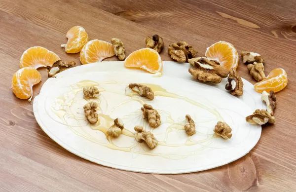 Christmas wafer with honey, walnuts and mandarin oranges — Stock Photo, Image