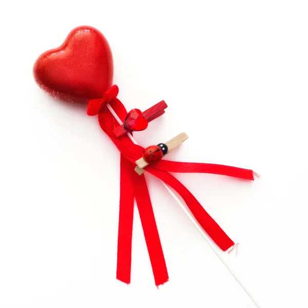 Red decorative valentine heart on a wand — Stock Photo, Image