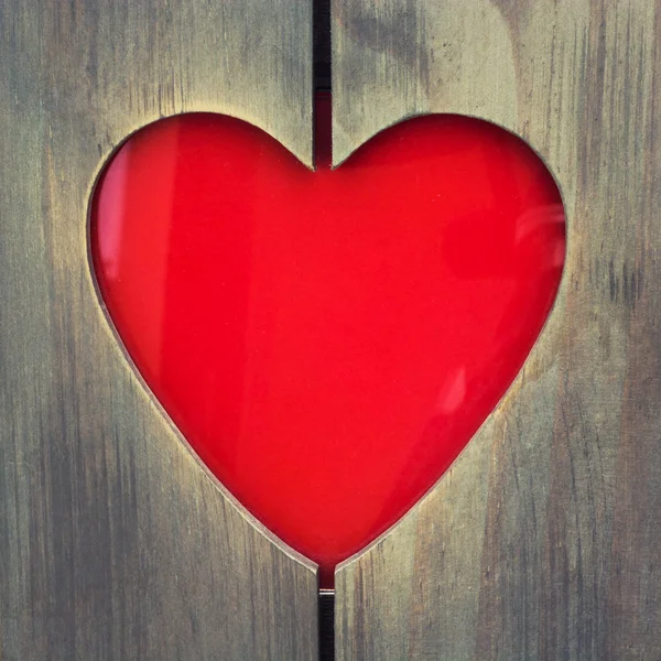 Dřevěný fotorámeček ve tvaru srdce — Stock fotografie