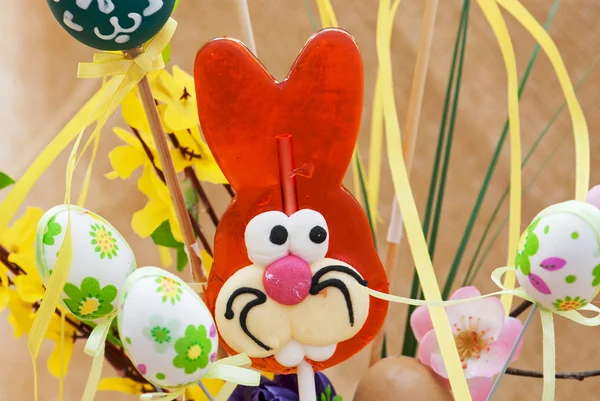 Lollipop-shaped Easter Bunny with eggs — Stock Photo, Image