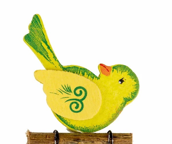 Lindo pájaro amarillo tallado en madera — Foto de Stock