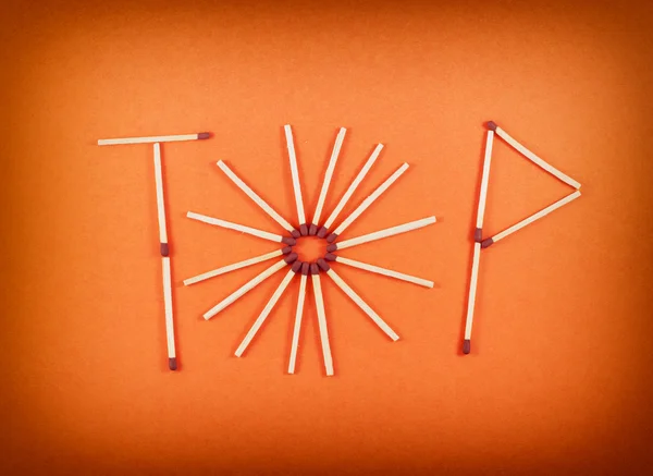 Word TOP made of matchsticks Stock Picture