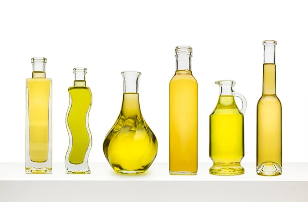 Variety Olive Oils Bottles White Shelf Isolated White Background — Stock Photo, Image