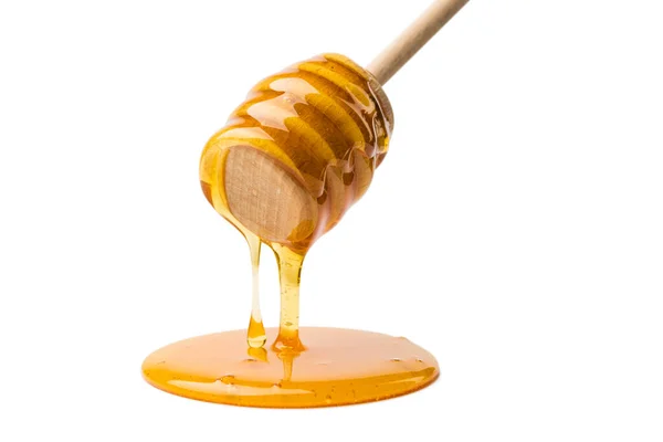 Honig Tropft Von Einem Holzwagen Auf Eine Pfütze Isoliert Auf — Stockfoto