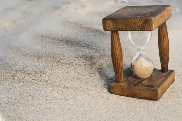Hourglass in Sand — Stock Photo, Image
