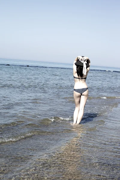 Magic portrait of female model in the sea in vacation — Stock Photo, Image