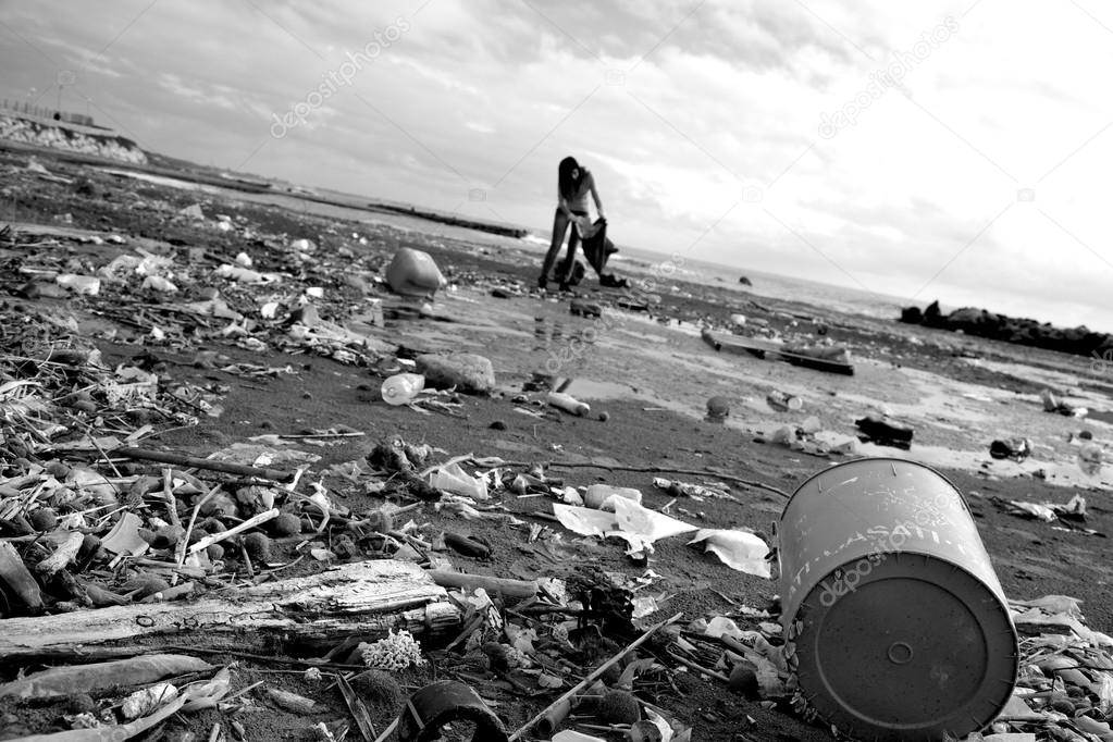 Ecological danger disaster on beach black and white