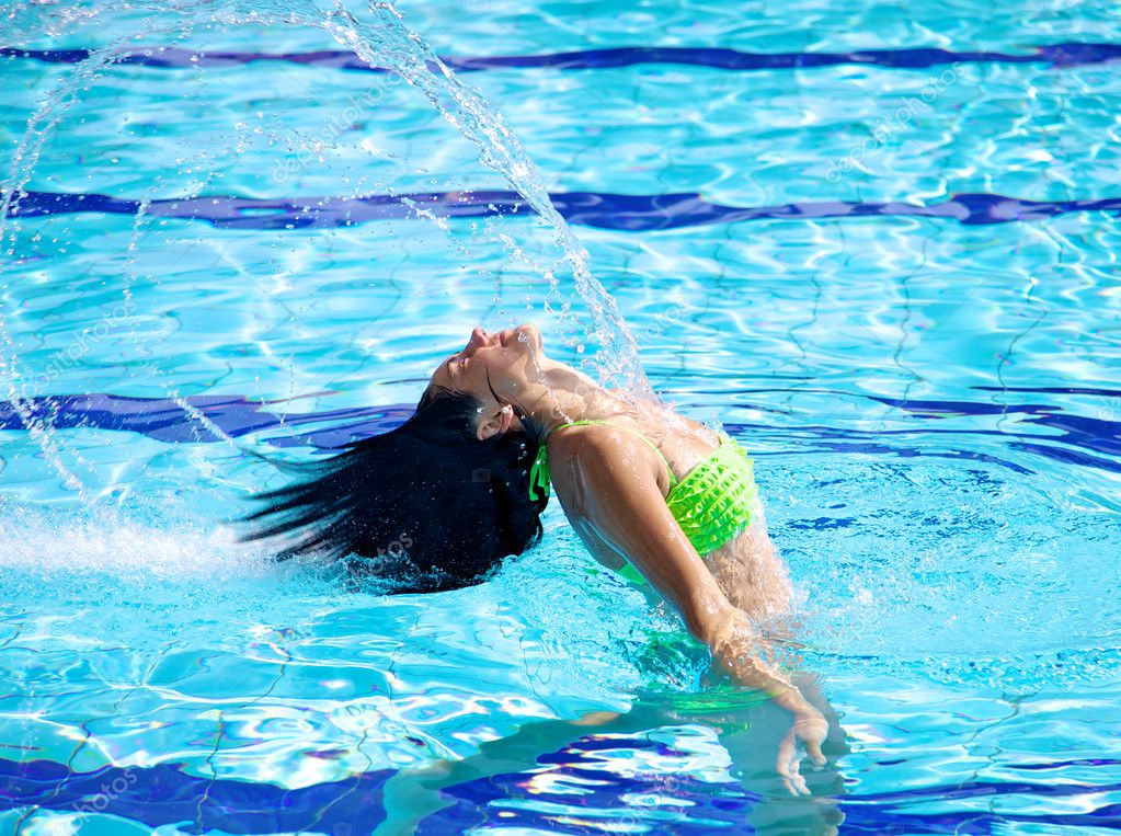 Flying long hair in swimming pool in summer — Stock Photo