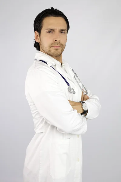 Médico guapo serio mirando —  Fotos de Stock