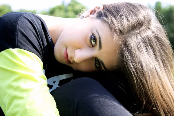 Closeup portrait of young female teenager smiling — Stock Photo, Image