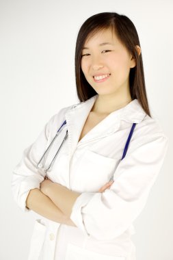 mutlu gülümseyen güzel Asyalı kadın doktor