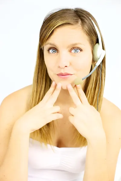 Cute blond girl with blue eyes and headphones — Stock Photo, Image
