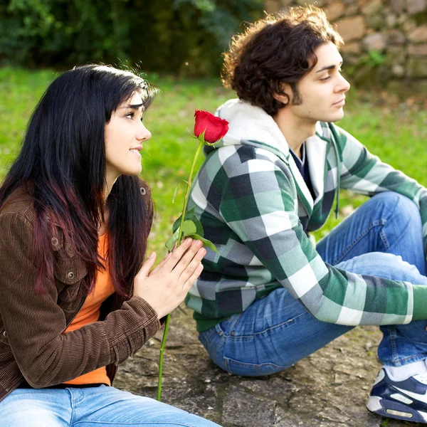 Young woman asking for forgiveness to angry boyfriend — Stock Photo, Image