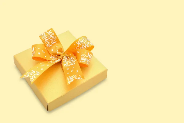 Gold Color Present Box Bright Yellow Ribbon Yellow Background — Stock Photo, Image